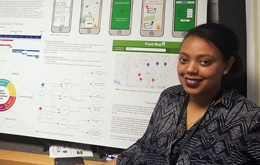 Computer science student at reserach poster