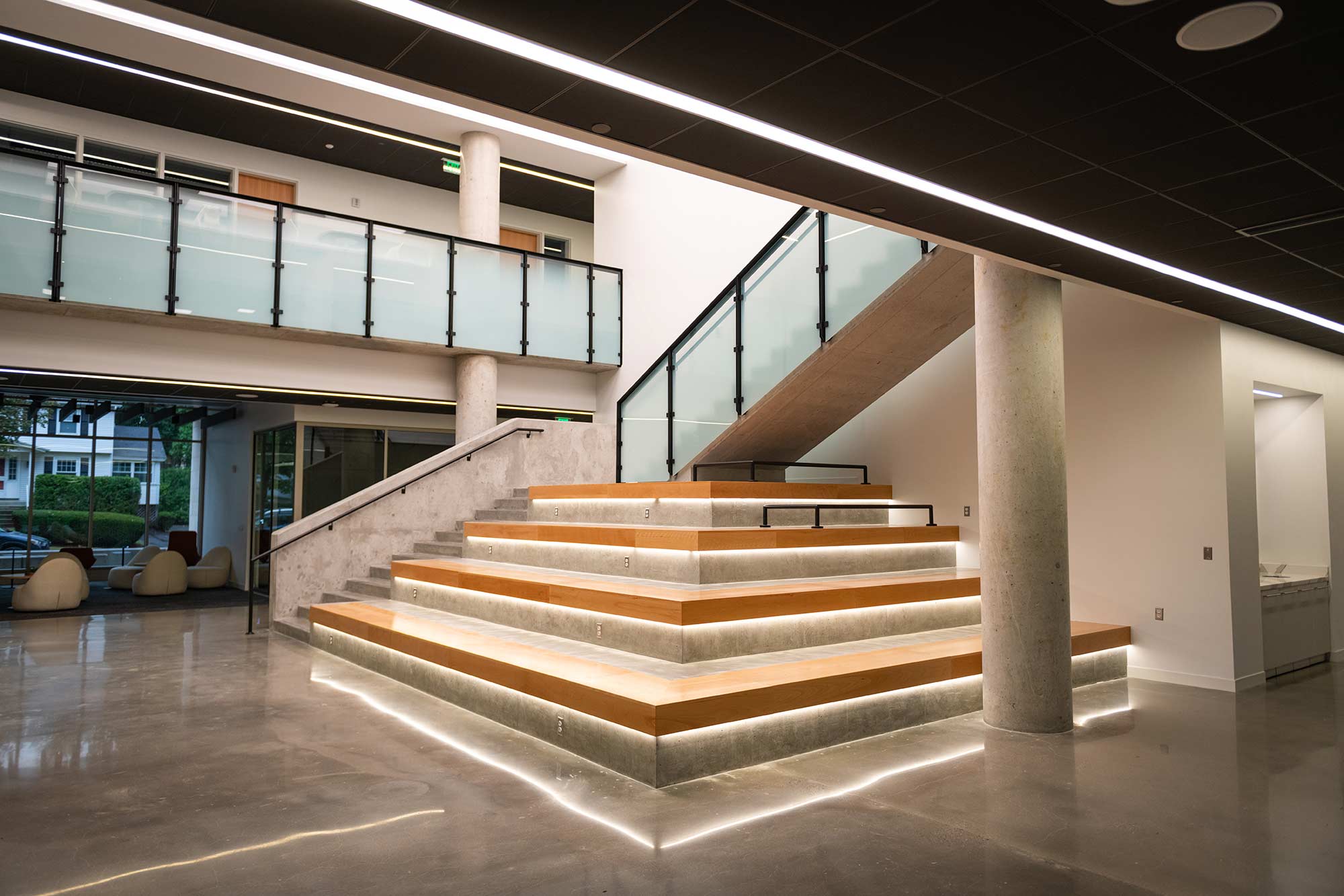 Illuminated central staircase in the atrium of the Center for Media Arts, Computing, and Design, Clark University