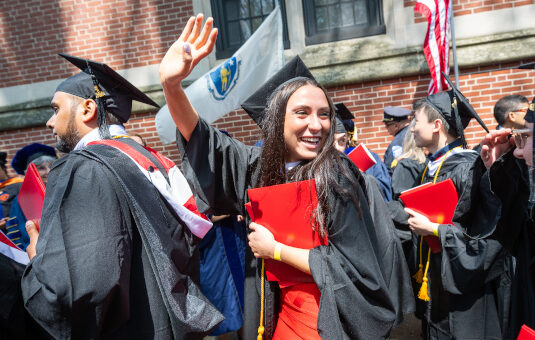 student in graduation cap and gown